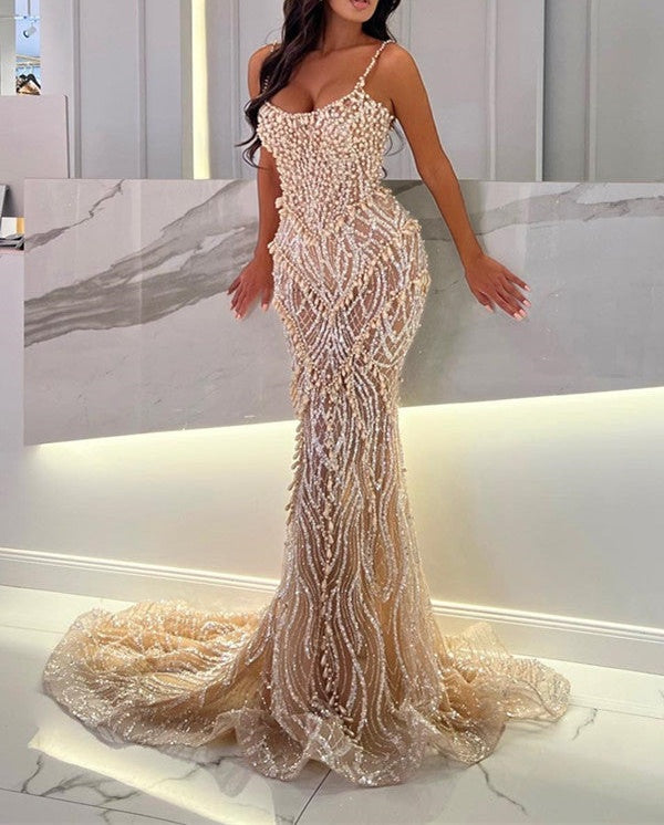 Mermaid Prom Dress with Spaghetti Straps and Sleeveless Design adorned with Beadings and Pearls